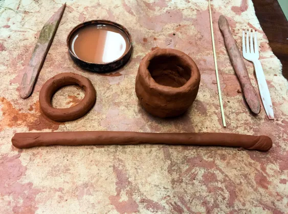 Learn basic pottery handbuilding techniques with this video! How to make a pinch pot, coil building and how to score and slip your clay together.