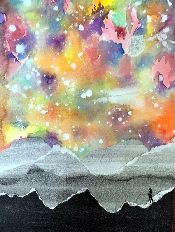 torn paper galaxy landscape