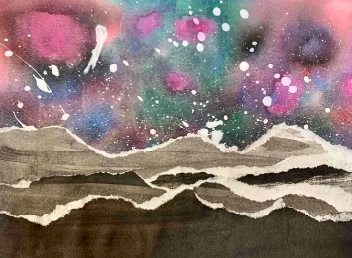 torn paper galaxy landscape