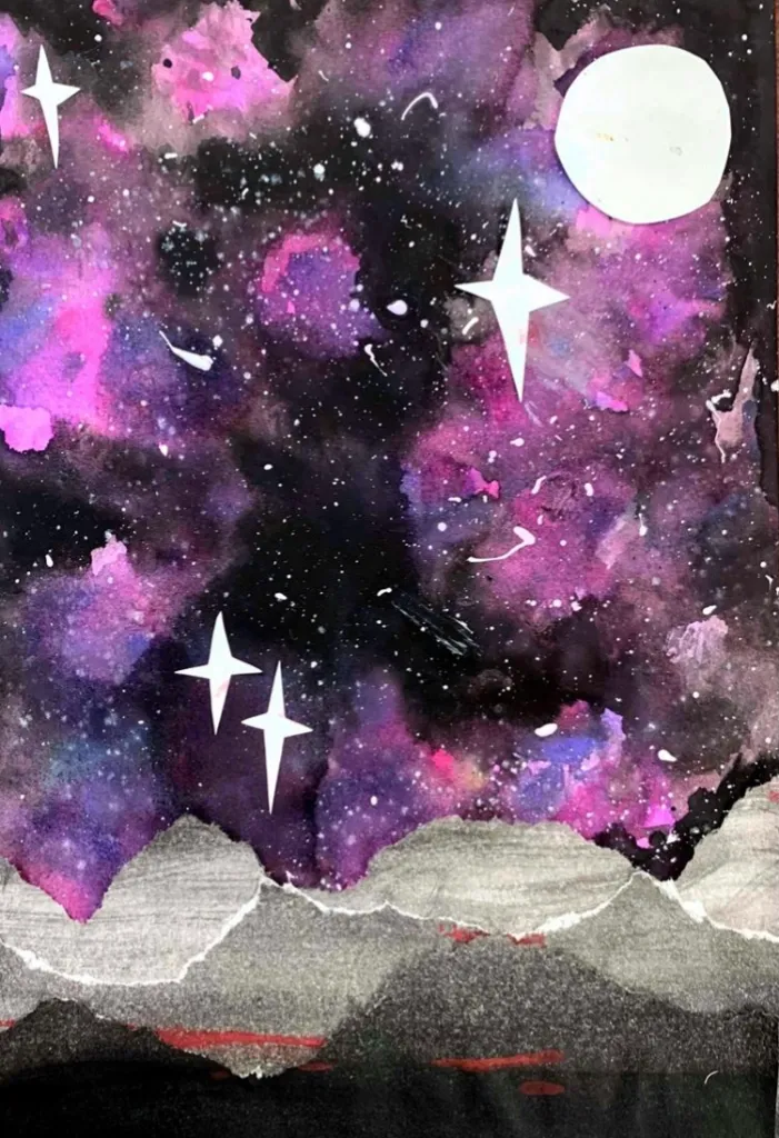 torn paper galaxy landscape