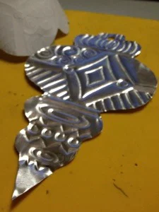 MetalEmbossingOrnament.jpg