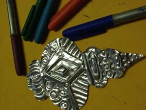 MetalEmbossingOrnament.jpg