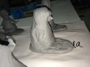 Ceramic Surfer Dude Penguin and surfboard