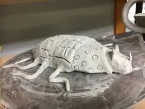 Roll a Beast Ceramic sculpture