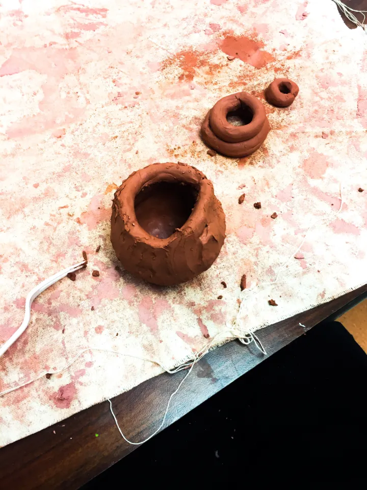 Learn basic pottery handbuilding techniques with this video! How to make a pinch pot, coil building and how to score and slip your clay together.