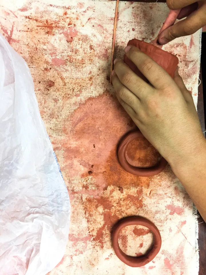 Learn basic pottery handbuilding techniques with this video! How to make a pinch pot, coil building and how to score and slip your clay together.