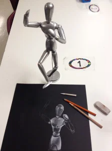 White charcoal on black paper